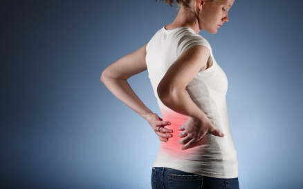 an image of a woman with low back pain an image of a woman with low back pain